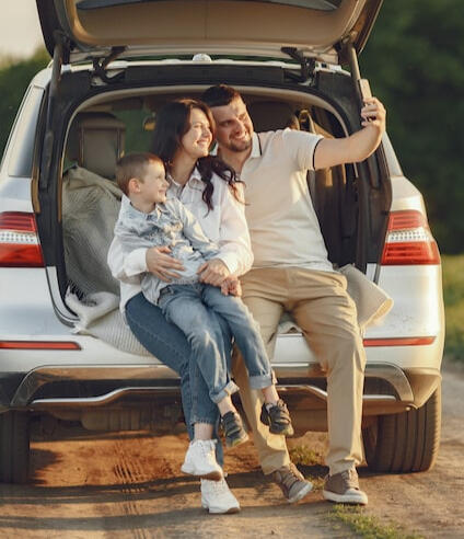 Happy family in car, header image for Mikey's Mobile Detailing Snohomish. Happy family in clean car. Header image for Mikey's Mobile Detailing.