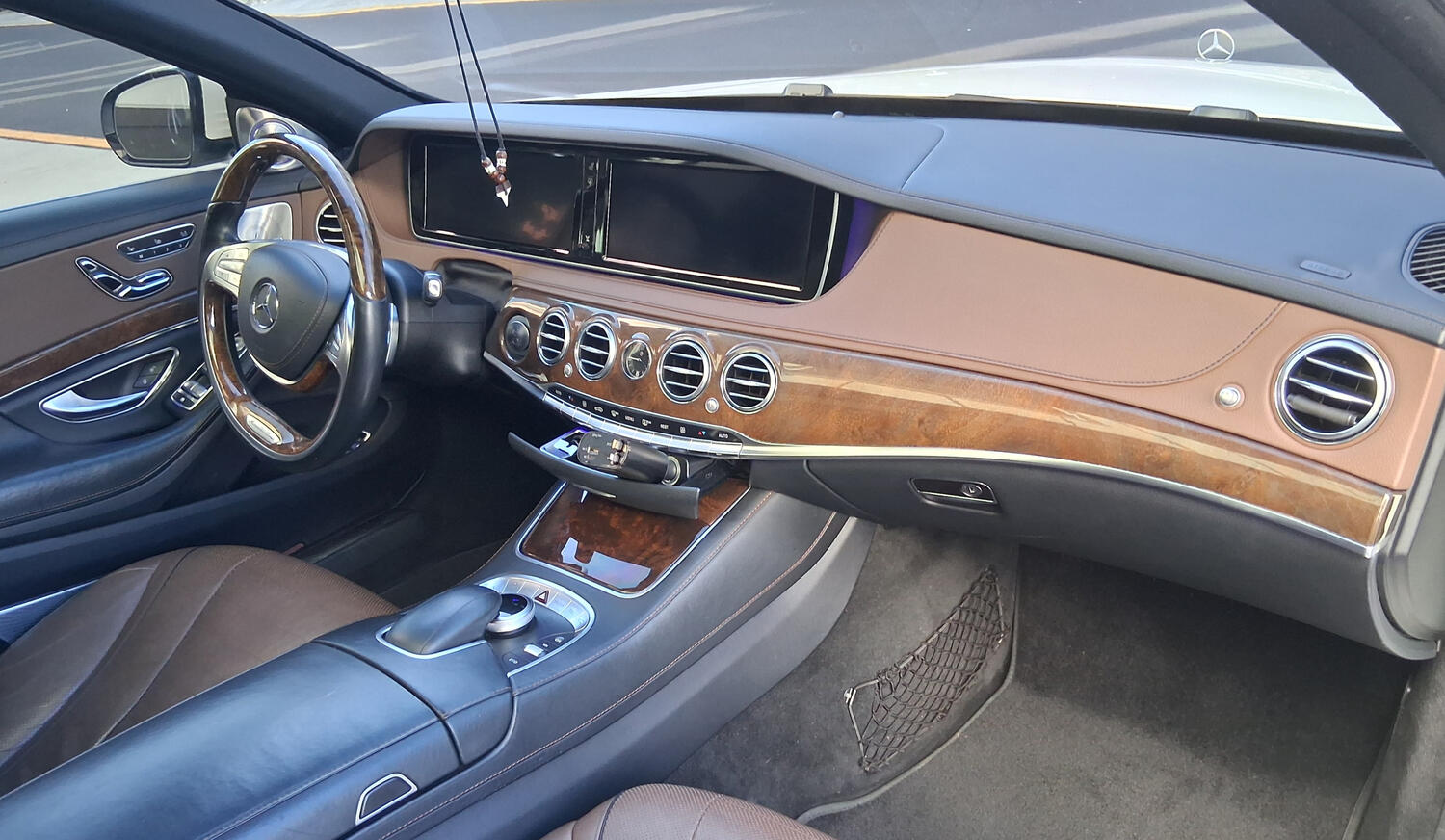 Inyerior of car with brown leather seats. Mobile detailing