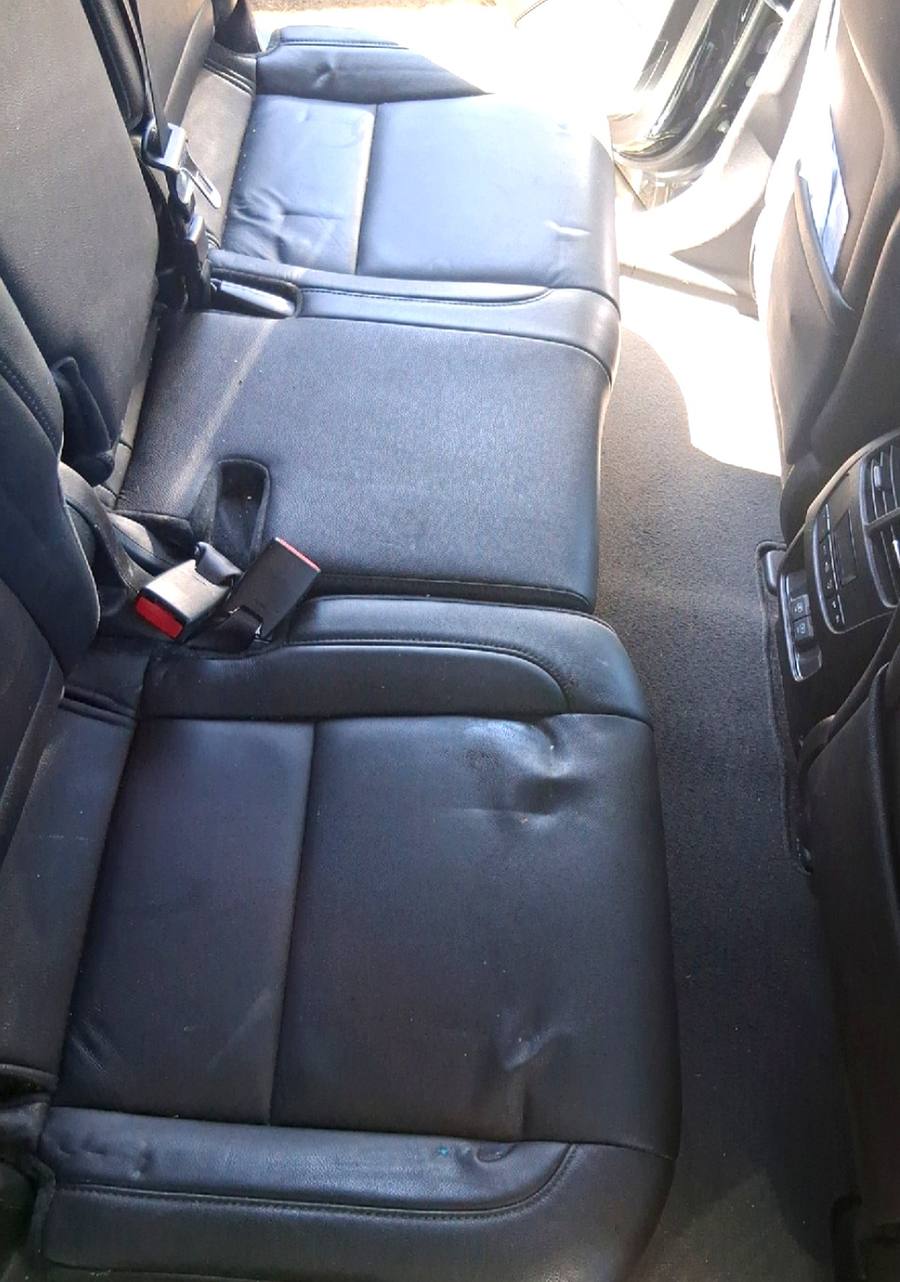 Detailed black leather rear seats by Mikey's Mobile Detailing, serving Bothell WA