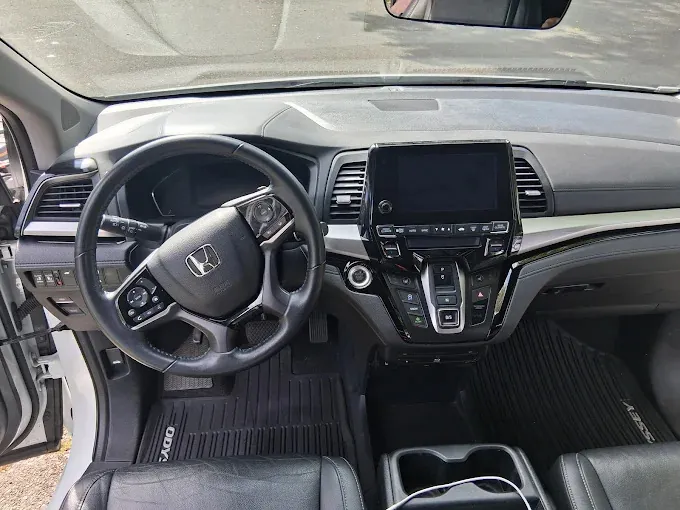 Honda Odyssey dashboard, steering wheel and console after an interior detail